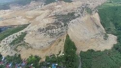 CLEAN : Toll jumps to 22 in Philippine monsoon landslide News Clip