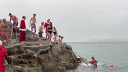 Swimmers take part in an annual Christmas Day swim in Dublin News Clip