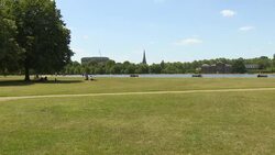 People sunbathing in Hyde Park News Clip
