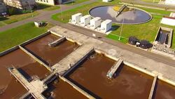 Aerial view to sewage treatment plant. Grey water recycling. Waste management theme. Stock Footage
