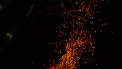 Charcoal Burning and Embers Flying into Thin Air Stock Footage
