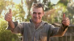 Middle aged farmer on farmland Stock Footage