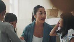 Asian teacher teaching student in art class Stock Footage