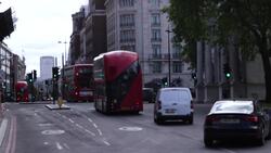 Cars and buses flow down Oxford Street as more commuters return to work News Clip
