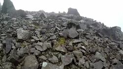 Mountain climbing, walking, hiking in low-visibility, Black Cuillin, Isle of Skye Stock Footage