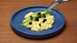 eating scrambled eggs & caviar with fork Stock Footage