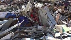 Scrap metal recycling plant and crane Stock Footage