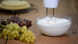 Whipped cream in glass bowl with whisks. Stock Footage