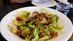 Motion of sesame salad on table inside restaurant Stock Footage