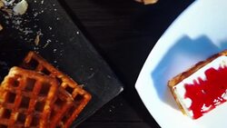 Making waffles with fresh raspberries Stock Footage