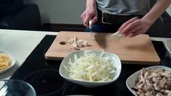 Woman cutting chicken meat Stock Footage
