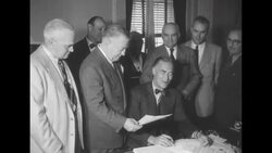 Officials look on as Massachusetts Gov. Christian Herter signs proclamation in Boston for "Jimmy Fund" for cancer research News Clip