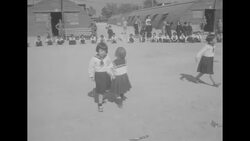 US soldiers host party for Korean orphans; give out food; little girls dance News Clip