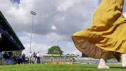 Sir Ed Davey takes part in a wheelbarrow obstacle course at Yeovil Town FC News Clip