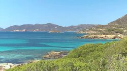 Beautiful untouched wilderness and the turquoise ocean water in sunny Sardinia. Stock Footage