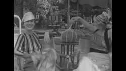 Fashion models show off swimsuits and other Summer attire at Miami Beach, Florida News Clip