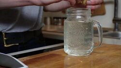 Young woman pouring lemonade Stock Footage