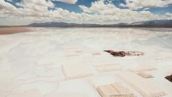 Drone’s Eye View: Salinas Grandes Salt Flats Reflect The Skies Stock Footage