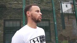 Slow motion shot of Steph Curry on a basketball court in east London Stock Footage