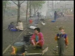 Kosovo War, 1999. Slobodan Milošević. Ethnic Albanians flee Kosovo. Refugee camps. NATO bombs Serbian targets. Refugee crisis and international aid. Stock Footage