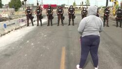 CLEAN : 'This is pain': Minneapolis protesters face off with state troopers after a night of riots News Clip