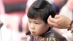 Haircut little girl Stock Footage