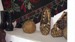 Traditional interior of the old Slavic house. On the stove lie the village bast shoes, a tangle of linen yarn. Stock Footage