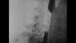 California, 1952: A rescue train arrives and stops near a stuck train while blowing its horns to signal Stock Footage