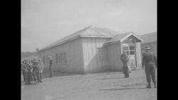 MPs stand guard outside Peace Pagoda where Korean Peace Conference negotiations are being held News Clip