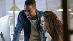 Young Woman Discussing Business Project with African Colleague Stock Footage