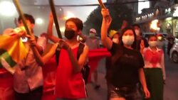 CLEAN : Yangon protesters march with torches and burn Burmese flag nearly six months after coup News Clip