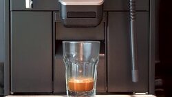 Making coffee latte or cappuccino at automatic machine Stock Footage