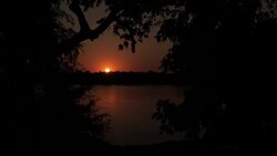 Sunsetting over Zambezi river News Clip