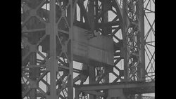 Construction workers replace a span on New York City's Triborough Bridge News Clip