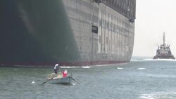 CLEAN : Megaship heads out of Suez after Egypt deal News Clip