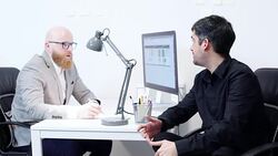 Man answering questions during job interview Stock Footage