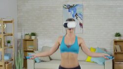 Woman Using Jump Rope for Workout Stock Footage