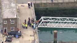 Aerial views of Border Force processing migrants in Dover News Clip
