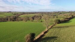 DRONE AERIALS - farmland in The Cotswolds, UK News Clip