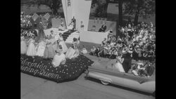 Iowa celebrates VEISHEA, a week-long spring festival, with floats and marching bands in parade at Ames, IA News Clip