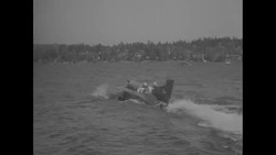 Stanley Sayres sets a new speed record in his hydroplane Slo-Mo-Shun IV on Lake Washington News Clip