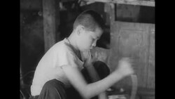 South Koreans in Seoul turn salvaged tin into material for roofing and walls of buildings News Clip