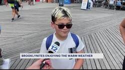 Brooklyn residents flock to Coney Island to enjoy hot weather News Clip