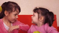 Children eat an apple. Stock Footage