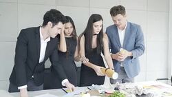 Brainstorming session Team Business People designers and working on creative in the office Stock Footage