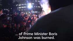 Mask-wearing protesters clash with police on Bonfire Night News Clip