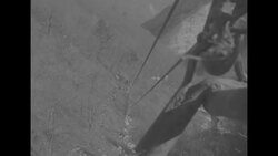 Trolley cable basket is used to carry supplies up to hill top positions and bring the wounded down during Korea war 1952 News Clip