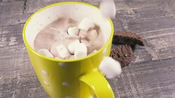 Slow motion hot chocolate in a mug and marshmallow Stock Footage