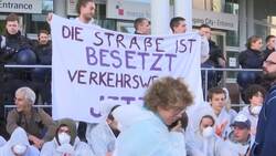 Climate protesters block Frankfurt car show Instructional Video