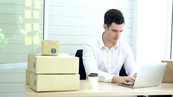 Man working using laptop check packing list order. Woman sent packing box for shipping parcel package at office. Delivery Shopping online. Stock Footage